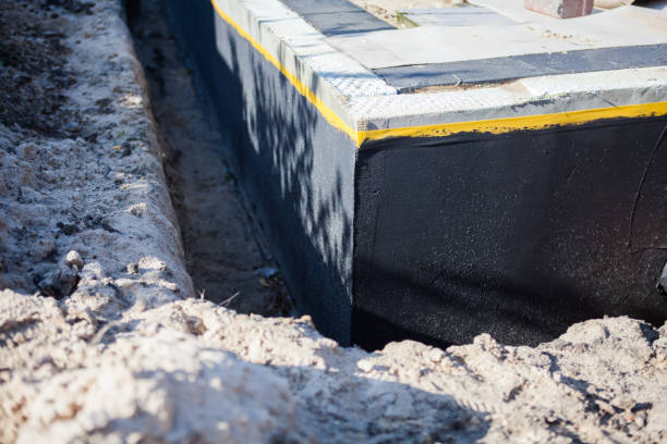 Professional Emergency Waterproofing technician working in Charlotte Hall, MD
